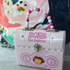 VINTAGE (NEW) DORA THE EXPLORER Metal Purse Pink by The Tin Box Company